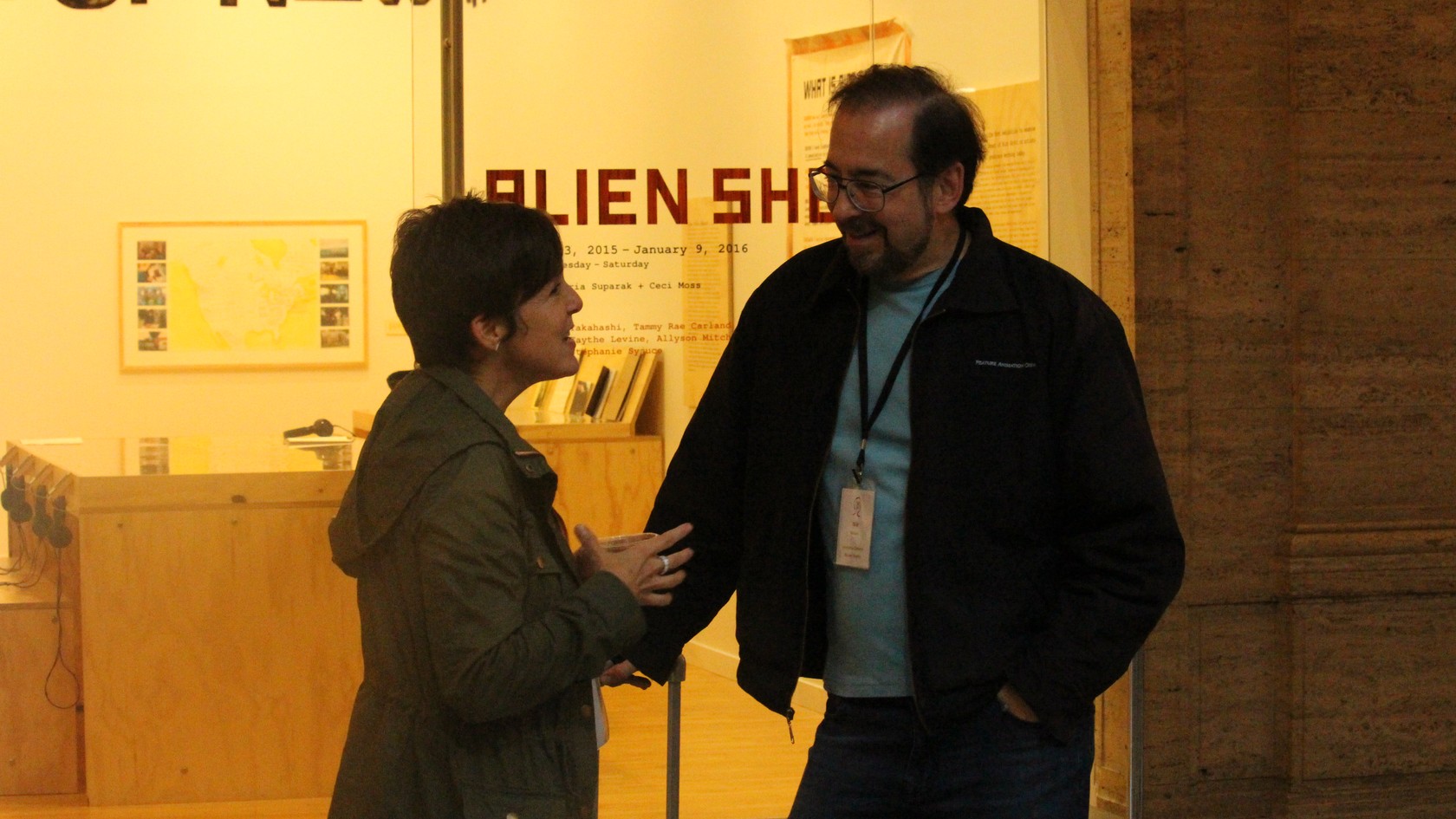 Two conference attendees talking at a reception