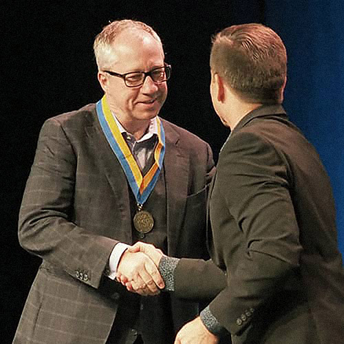 Jan Ditgen receiving his Certified Speaking Professional designation